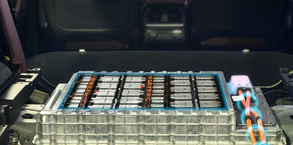 Image of an electric vehicle's battery pack with visible cell modules and cabling, representing the battery manufacturing and recycling industry.