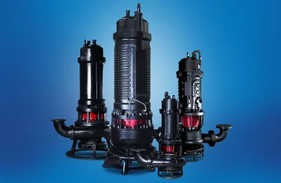 Group of black submersible pumps featuring red internal components, designed for slurry and sediment-heavy environments.